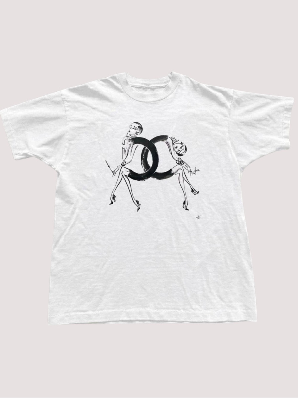 White CC Graphic T-Shirt with Black Double-Ring Illustration